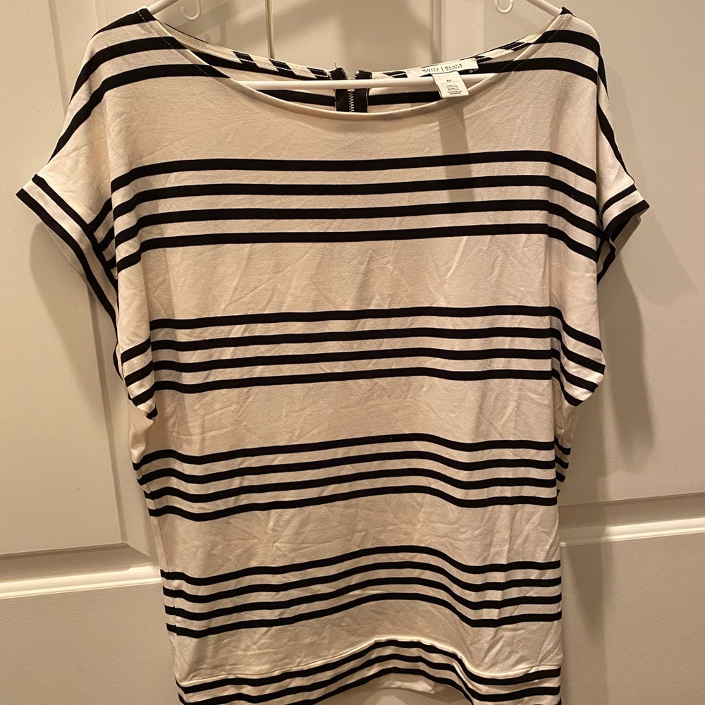 Women’s top. Brand new. Size medium.